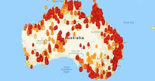 A map illustrates the many locations of active wildfires in Australia.