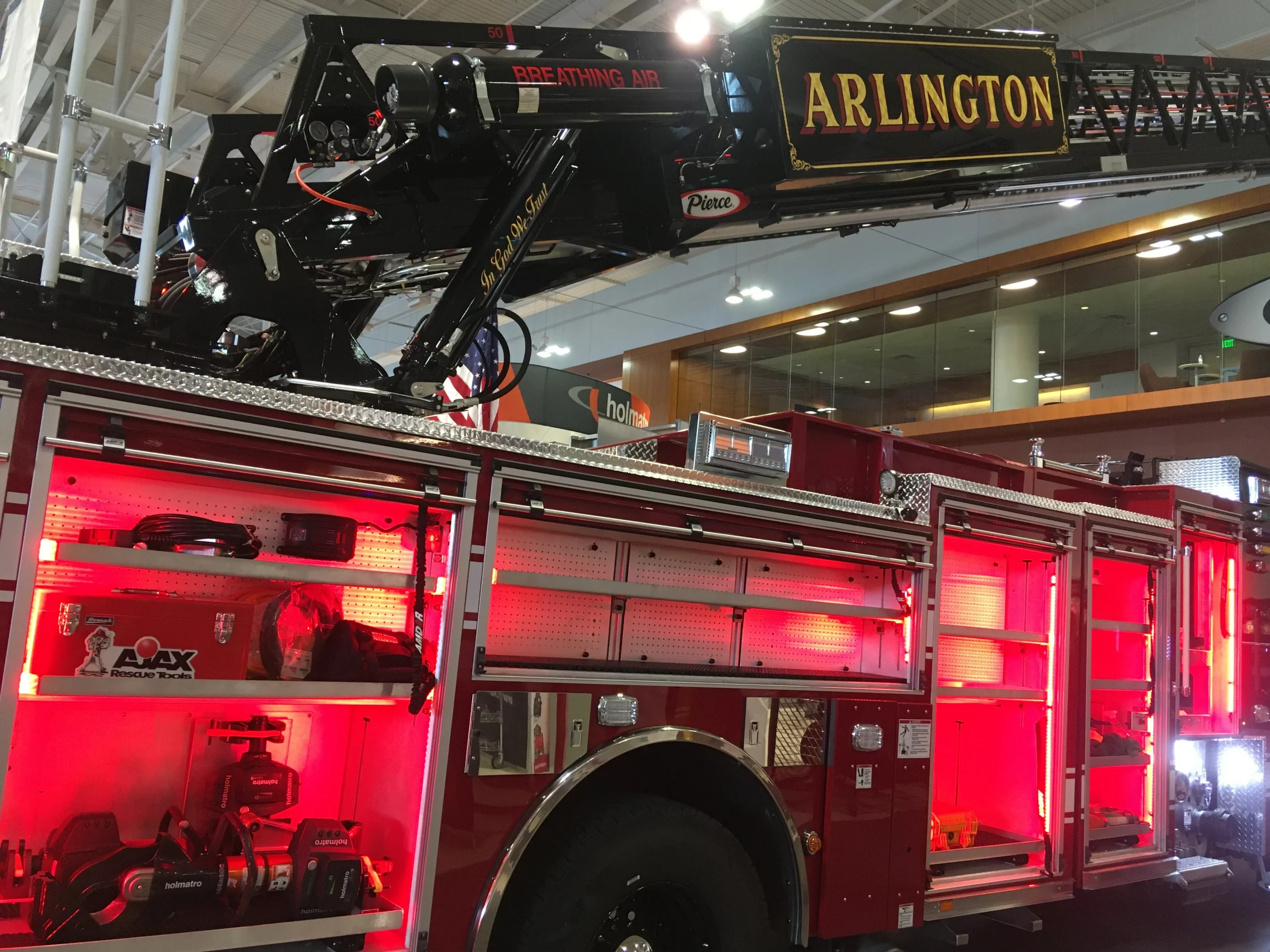 A fire truck's ladder reads, "Arlington."